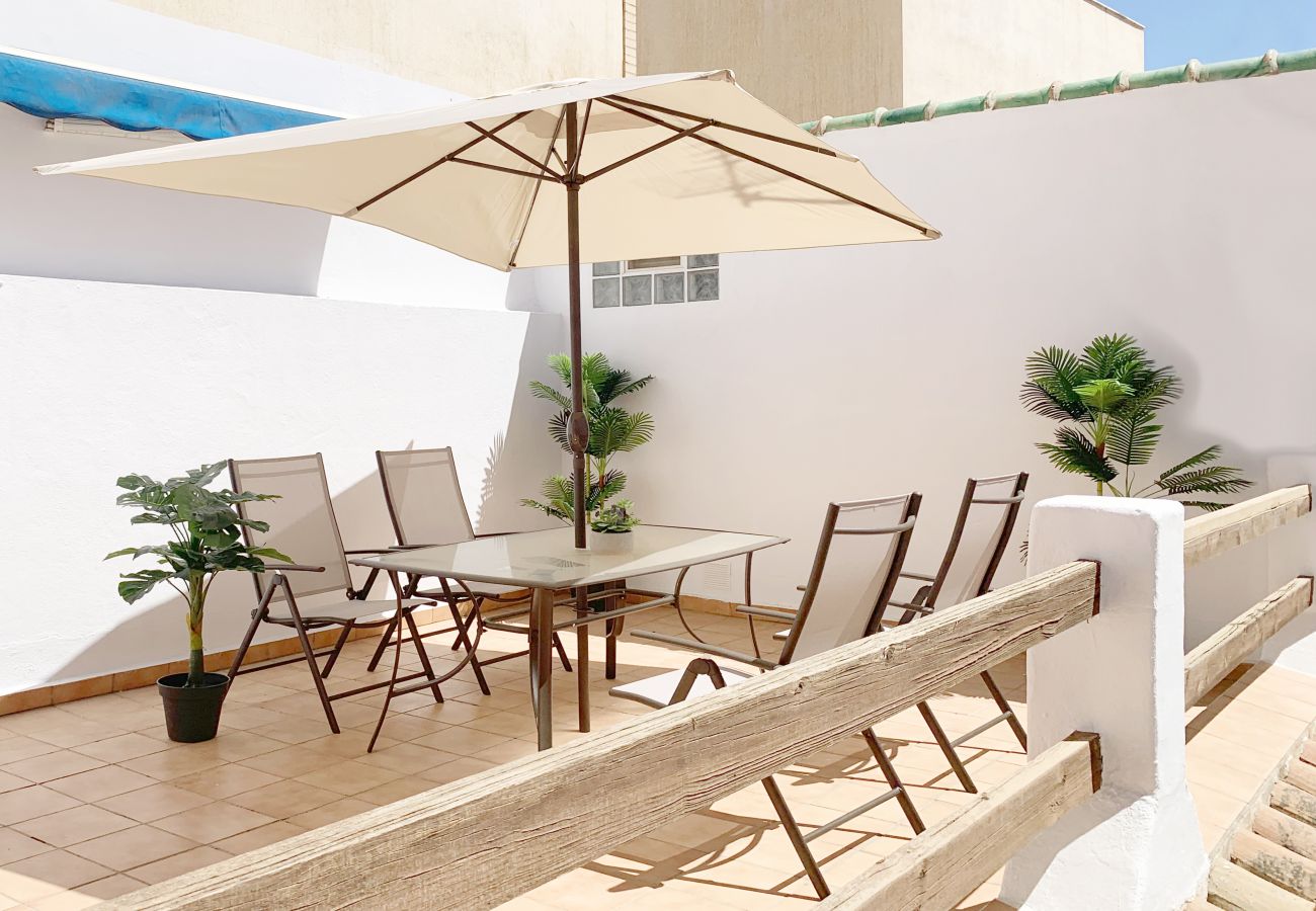 Large sunny private terrace, with barbecue, to enjoy with the whole family or friends